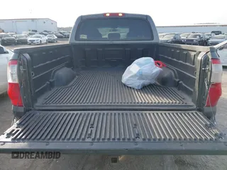 2004 Toyota Tundra Limited with VIN 5TBET38144S451620, listed as a IAAI auction lot 41399718 with 198,808 mi miles and . Bid and sale history available at DreamBid. Image 16.