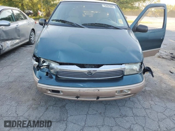 1997 Mercury Villager GS z VIN 4M2DV1119VDJ63417, wystawiony jako Copart lot #75462584 z przebiegiem 132 875 mil mil oraz Szkody całkowita. Historia ofert i sprzedaży dostępna na DreamBid. Obrazek 13.