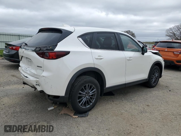 2020 Mazda CX-5 Touring z VIN JM3KFBCM8L1789067, wystawiony jako Copart lot #54953015 z przebiegiem 134 306 mil mil oraz Nie do naprawy • Non repairable. Historia ofert i sprzedaży dostępna na DreamBid. Obrazek 3.