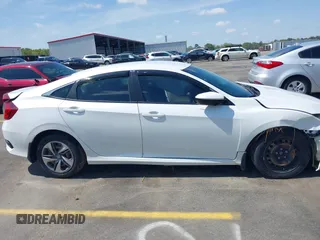2020 Honda Civic LX with VIN 2HGFC2F61LH568767, listed as a IAAI auction lot 41909755 with 56,213 mi miles and . Bid and sale history available at DreamBid. Image 14.