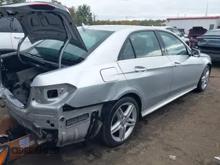 2014 Mercedes-Benz E-Class E 350 Luxury with VIN WDDHF8JB8EA852345, listed as a IAAI auction lot 40765437 with 76,742 mi miles. Bid and sale history available at carsss.com. Image 4.