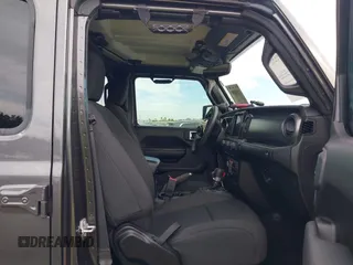 2023 Jeep Gladiator Sport S z VIN 1C6HJTAG9PL554845, wystawiony jako IAAI lot #41312360 z przebiegiem 18 077 mil mil oraz . Historia ofert i sprzedaży dostępna na DreamBid. Obrazek 5.
