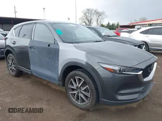 2017 Mazda CX-5 Grand Touring with VIN JM3KFBDL3H0143194, listed as a IAAI auction lot 42049258 with 74,159 mi miles. Bid and sale history available at carsss.com. Image 1.