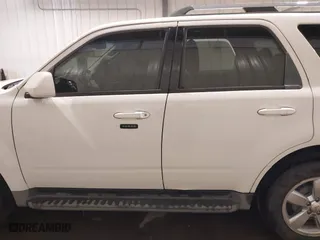 2011 Mercury Mariner Premier with VIN 4M2CN9HG3BKJ02026, listed as a IAAI auction lot 40254703 with 99,000 mi miles. Bid and sale history available at carsss.com. Image 14.