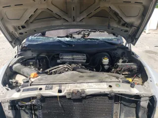 2000 Dodge 1500 z VIN 3B7HF12Z8YG160976, wystawiony jako Copart lot #55044765 z przebiegiem 362 570 mil mil oraz Szkoda całkowita • Salvage title. Historia ofert i sprzedaży dostępna na DreamBid. Obrazek 11.