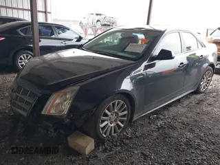 2010 Cadillac CTS Luxury with VIN 1G6DE5EGXA0135321, listed as a IAAI auction lot 41197211 with 161,946 mi miles. Bid and sale history available at carsss.com. Image 2.