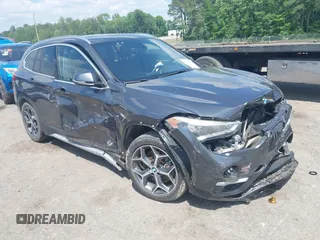 2016 BMW X1 xDrive28i z VIN WBXHT3C34G5E47922, wystawiony jako IAAI lot #42178666 z przebiegiem 147 149 mil mil oraz . Historia ofert i sprzedaży dostępna na DreamBid. Obrazek 1.