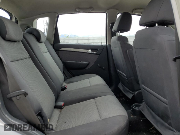2009 Chevrolet Aveo 1LT z VIN KL1TD66E19B613471, wystawiony jako Copart lot #58977805 z przebiegiem 109 767 mil mil oraz Szkoda całkowita • Salvage title. Historia ofert i sprzedaży dostępna na DreamBid. Obrazek 10.