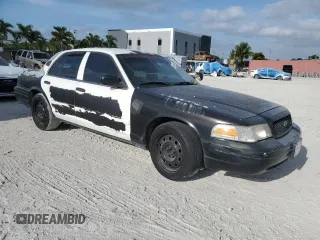 2005 Ford Police Interceptor with VIN 2FAFP71W35X128684, listed as a Copart auction lot 54002165 with 144,766 mi miles and Clean title. Bid and sale history available at DreamBid. Image 4.
