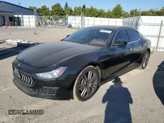 2018 Maserati Ghibli with VIN ZAM57XSA4J1268685, listed as a Copart auction lot 62302313 with 76,576 mi miles. Bid and sale history available at carsss.com. Image 1.