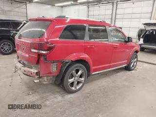 2016 Dodge Journey Crossroad Plus z VIN 3C4PDDGGXGT245673, wystawiony jako IAAI lot #41915165 z przebiegiem 124 861 mil mil oraz . Historia ofert i sprzedaży dostępna na DreamBid. Obrazek 4.