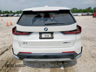 2023 BMW X1 xDrive28i with VIN WBX73EF06P5V77660, listed as a Copart auction lot 57342015 with 32,028 mi miles and Salvage title. Bid and sale history available at DreamBid. Image 6.