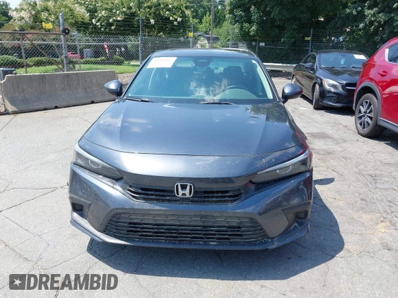 2023 Honda Civic EX with VIN 2HGFE1F75PH302414, listed as a IAAI auction lot 42680807 with 49,520 mi miles and . Bid and sale history available at DreamBid. Image 12.