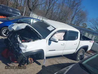2018 Toyota Tacoma SR with VIN 5TFCZ5AN6JX144056, listed as a IAAI auction lot 41623760 with Not Provided miles and . Bid and sale history available at DreamBid. Image 13.