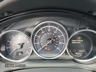 2016 Mazda CX-9 Grand Touring с VIN JM3TCADY2G0121026, выставлен на аукционе Copart как лот 60518105 с пробегом 104 923 миль миль и Списание • Salvage title. История ставок и продаж доступна на DreamBid. Изображение 9.