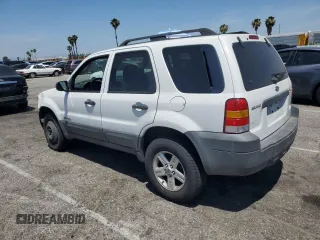 2007 Ford Escape Hybrid with VIN 1FMCU49H87KB61613, listed as a Copart auction lot 58083235 with 129,049 mi miles and Salvage title. Bid and sale history available at DreamBid. Image 2.