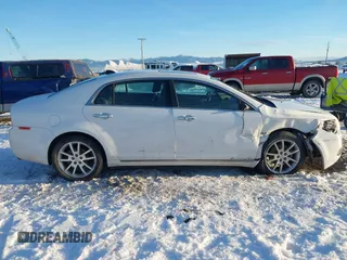 2012 Chevrolet Malibu LTZ with VIN 1G1ZG5E73CF270839, listed as a IAAI auction lot 41284490 with 133,423 mi miles and . Bid and sale history available at DreamBid. Image 13.