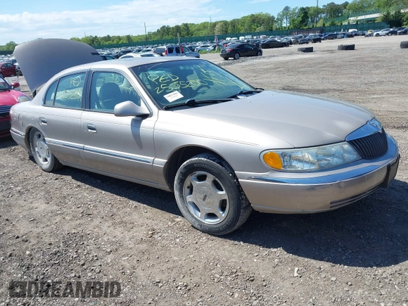 2001 Lincoln Continental z VIN 1LNHM97V31Y638576, wystawiony jako IAAI lot #42305531 z przebiegiem Nie podano mil oraz . Historia ofert i sprzedaży dostępna na DreamBid. Obrazek 1.