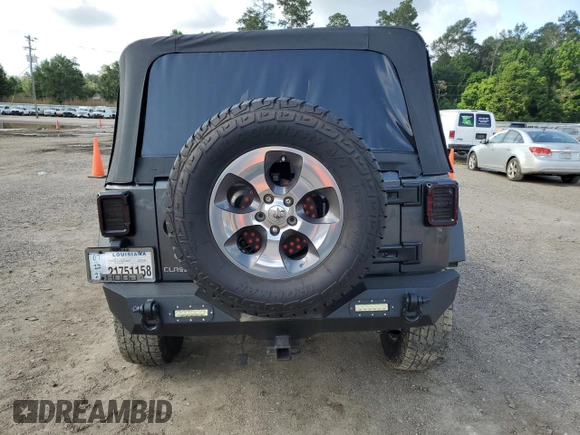 2017 Jeep Wrangler Unlimited Sport with VIN 1C4BJWDG8HL680627, listed as a Copart auction lot 61241735 with 100,890 mi miles and Salvage title. Bid and sale history available at DreamBid. Image 6.
