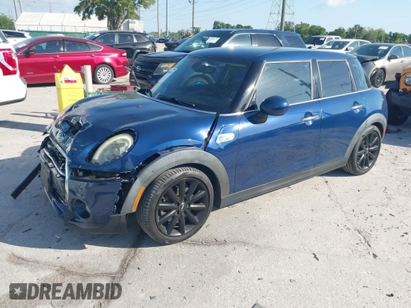 2016 MINI Cooper Hardtop 4 Door S with VIN WMWXU3C54G2D30766, listed as a IAAI auction lot 42008026 with 101,898 mi miles. Bid and sale history available at carsss.com. Image 2.