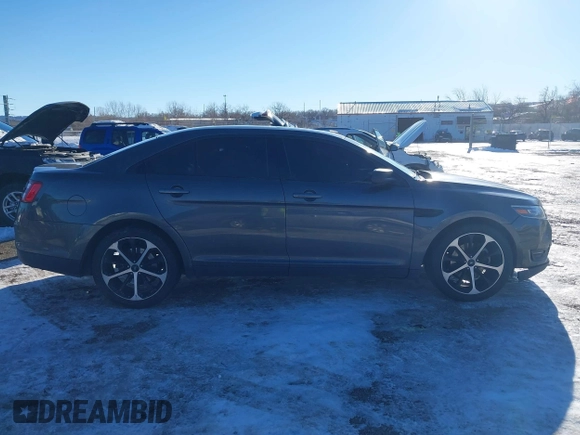 2015 Ford Taurus Limited with VIN 1FAHP2J85FG165823, listed as a IAAI auction lot 41315889 with 134,165 mi miles. Bid and sale history available at carsss.com. Image 13.