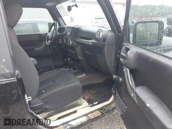 2015 Jeep Wrangler Willys Wheeler with VIN 1C4AJWAG8FL759566, listed as a IAAI auction lot 42716154 with 95,744 mi miles and . Bid and sale history available at DreamBid. Image 5.