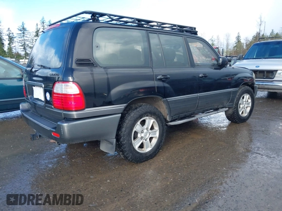 2001 Lexus LX 470 with VIN JTJHT00W613500563, listed as a IAAI auction lot 41730804 with 232,647 mi miles and . Bid and sale history available at carsss.com. Image 4.
