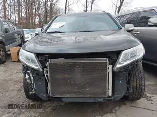 2015 Kia Sorento SX with VIN 5XYKW4A74FG603479, listed as a IAAI auction lot 41515797 with 151,496 mi miles. Bid and sale history available at carsss.com. Image 12.