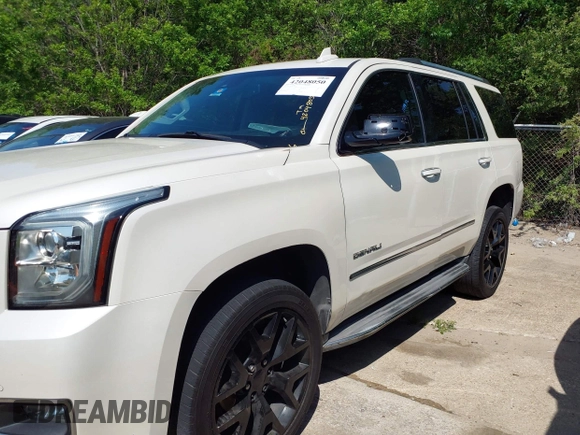 2015 GMC Yukon Denali with VIN 1GKS1CKJ8FR575730, listed as a IAAI auction lot 42048050 with 113,077 mi miles. Bid and sale history available at carsss.com. Image 6.