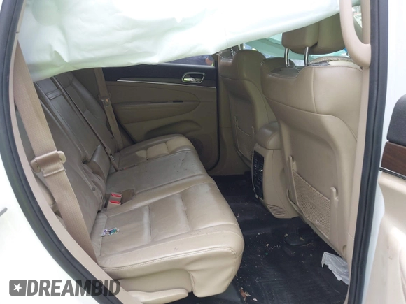 2018 Jeep Grand Cherokee Limited with VIN 1C4RJFBG0JC144620, listed as a IAAI auction lot 42018572 with 124,874 mi miles and . Bid and sale history available at DreamBid. Image 8.
