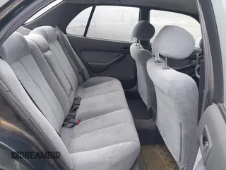 1994 Toyota Camry LE z VIN JT2GK12E1R0036423, wystawiony jako IAAI lot #41922375 z przebiegiem 211 529 mil mil oraz . Historia ofert i sprzedaży dostępna na DreamBid. Obrazek 8.