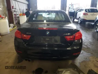 2015 BMW 4 Series 428i xDrive with VIN WBA3T1C58FP820289, listed as a Copart auction lot 84008124 with 67,675 mi miles and Salvage Title. Bid and sale history available at carsss.com. Image 6.