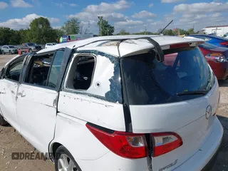 2013 Mazda 5 Touring with VIN JM1CW2CLXD0151396, listed as a IAAI auction lot 40479013 with 118,314 mi miles and . Bid and sale history available at DreamBid. Image 13.