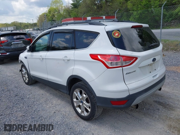 2013 Ford Escape SE with VIN 1FMCU0G90DUB37052, listed as a IAAI auction lot 42132973 with 169,975 mi miles and . Bid and sale history available at DreamBid. Image 3.