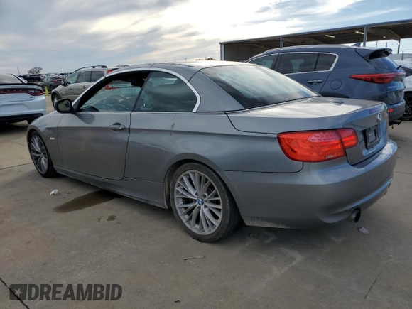 2011 BMW 3 Series 335i with VIN WBADX7C5XBE261099, listed as a Copart auction lot 42295595 with 106,018 mi miles and Clean Title. Bid and sale history available at carsss.com. Image 2.