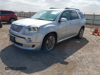 2011 GMC Acadia Denali with VIN 1GKKRTED5BJ402089, listed as a IAAI auction lot 41787001 with 165,030 mi miles and . Bid and sale history available at DreamBid. Image 2.