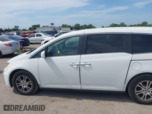 2013 Honda Odyssey EX z VIN 5FNRL5H44DB024764, wystawiony jako IAAI lot #42256598 z przebiegiem 169 708 mil mil oraz . Historia ofert i sprzedaży dostępna na DreamBid. Obrazek 14.