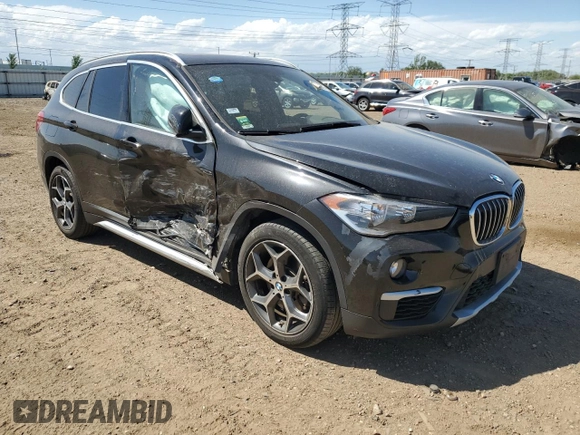 2018 BMW X1 xDrive28i with VIN WBXHT3C38J5K28174, listed as a Copart auction lot 57333385 with 50,064 mi miles and Salvage title. Bid and sale history available at DreamBid. Image 4.