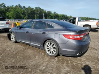 2013 Hyundai Azera с VIN KMHFH4JG4DA323839, выставлен на аукционе Copart как лот 58860835 с пробегом 180 982 миль миль и Списание • Salvage title. История ставок и продаж доступна на DreamBid. Изображение 2.