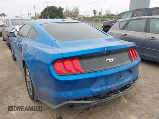 2020 Ford Mustang EcoBoost with VIN 1FA6P8TH0L5103874, listed as a IAAI auction lot 41578948 with 73,594 mi miles. Bid and sale history available at carsss.com. Image 3.