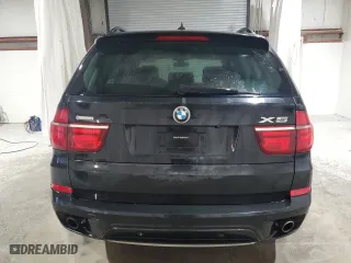 2011 BMW X5 35i with VIN 5UXZV4C58BL413906, listed as a Copart auction lot 48523905 with 161,227 mi miles and Salvage Title. Bid and sale history available at carsss.com. Image 6.