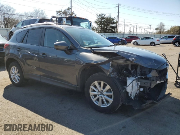 2014 Mazda CX-5 Touring with VIN JM3KE2CY7E0366690, listed as a Copart auction lot 50783635 with 127,853 mi miles and Salvage Title. Bid and sale history available at carsss.com. Image 4.