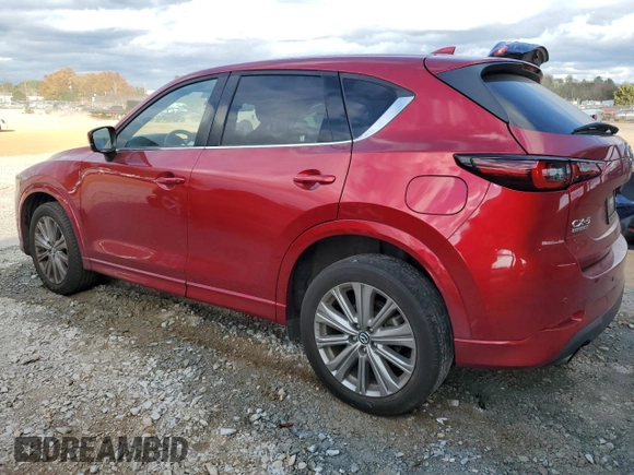 2023 Mazda CX-5 Signature with VIN JM3KFBXY4P0100652, listed as a Copart auction lot 82235664 with 29,344 mi miles and Salvage Title. Bid and sale history available at carsss.com. Image 2.
