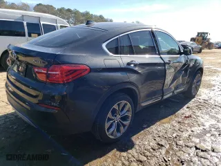 2016 BMW X4 xDrive35i with VIN 5UXXW5C5XG0N91545, listed as a Copart auction lot 36334233 with 69,740 mi miles. Bid and sale history available at carsss.com. Image 3.