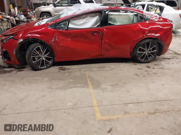 2024 Toyota Prius LE with VIN JTDADABU8R3013976, listed as a IAAI auction lot 41621800 with 7,475 mi miles and . Bid and sale history available at DreamBid. Image 14.