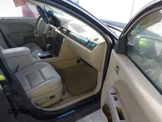 2007 Ford Five Hundred SEL z VIN 1FAHP24137G126681, wystawiony jako IAAI lot #42276804 z przebiegiem 146 725 mil mil oraz . Historia ofert i sprzedaży dostępna na DreamBid. Obrazek 5.