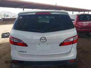 2013 Mazda 5 Touring with VIN JM1CW2CL0D0159894, listed as a IAAI auction lot 42386026 with 121,879 mi miles and . Bid and sale history available at DreamBid. Image 16.
