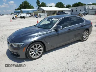 2018 BMW 3 Series 330e with VIN WBA8E1C58JA167698, listed as a Copart auction lot 62314295 with 169,420 mi miles and Salvage title. Bid and sale history available at DreamBid. Image 1.
