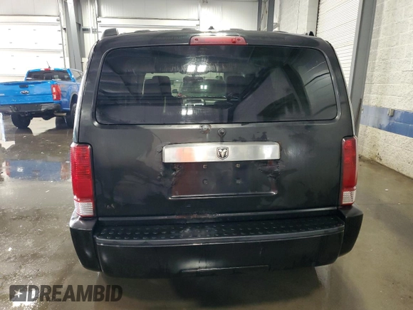 2008 Dodge Nitro SLT z VIN 1D8GU58KX8W206104, wystawiony jako Copart lot #71740974 z przebiegiem 236 981 mil mil oraz Szkoda całkowita • Salvage title. Historia ofert i sprzedaży dostępna na DreamBid. Obrazek 6.