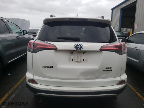 2016 Toyota RAV4 Hybrid XLE with VIN JTMRJREV7GD051091, listed as a Copart auction lot 73675162 with 168,832 mi miles. Bid and sale history available at carsss.com. Image 6.